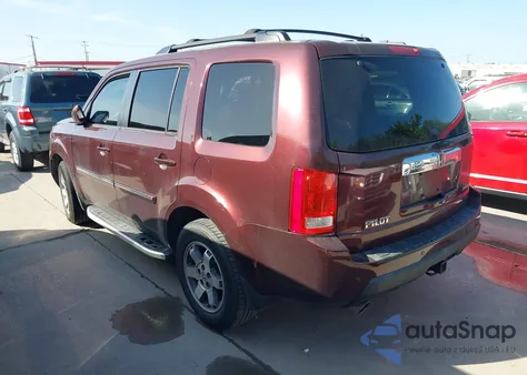2011 Honda Pilot Touring z USA, uszkodzony, nr VIN 5FNYF3H90BB030206